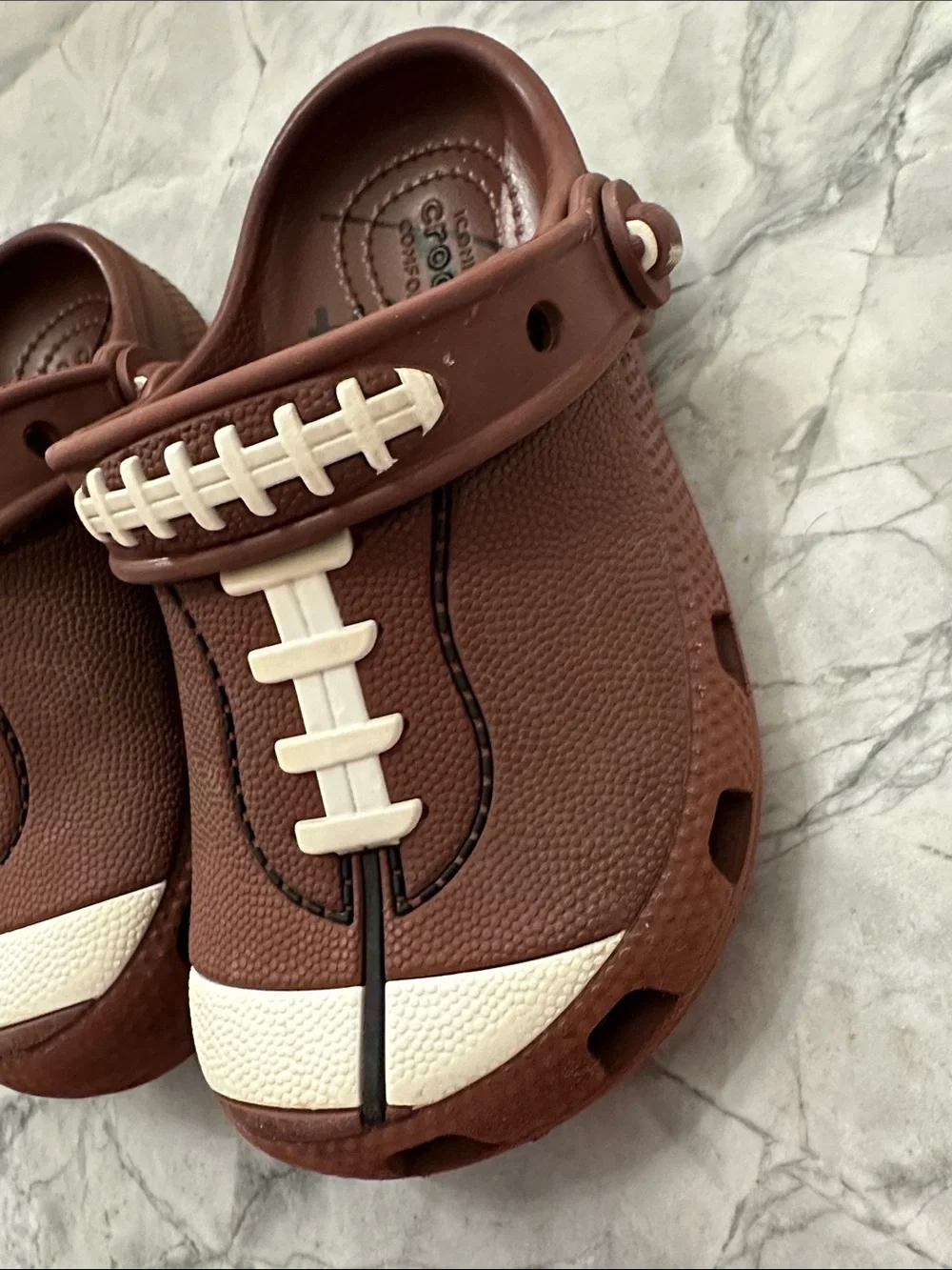 CROCS Kids Football Clog in Brown and White